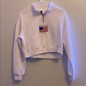 cropped quarter zipped white sweatshirt
